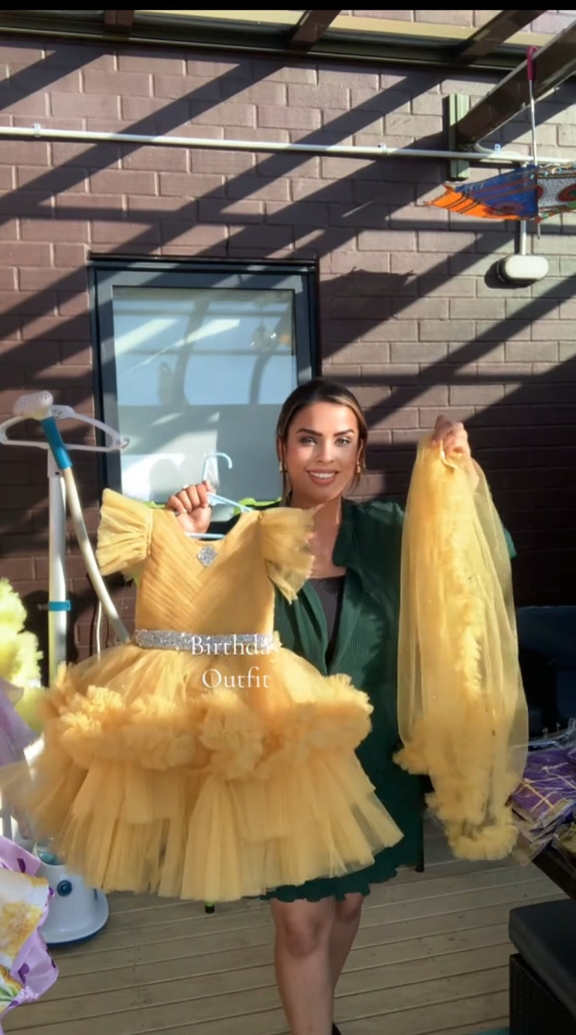 Yellow Embellished Dress Featuring A Detachable Trail