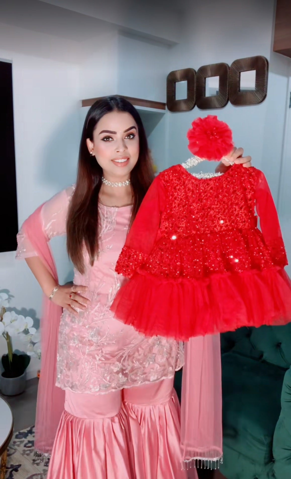 Red colour sequin frock with big bow and hair accessory